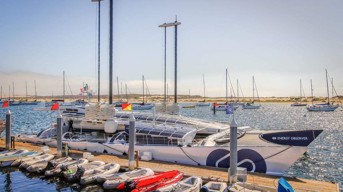 The Energy Observer catamaran is docked in Morro Bay for a stopover on its trip up the coast to San Francisco. Solar panels line the roof of the boat, which is entirely self-sufficient and uses an electro-hydrogen system to power its motors.