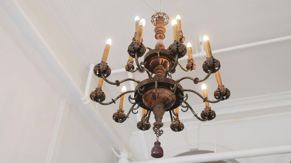 As part of the renovation of the Anderson Hotel Apartments, old fixtures were updated with modern wiring and energy-efficient lights, seen here on Sept. 16, 2024.