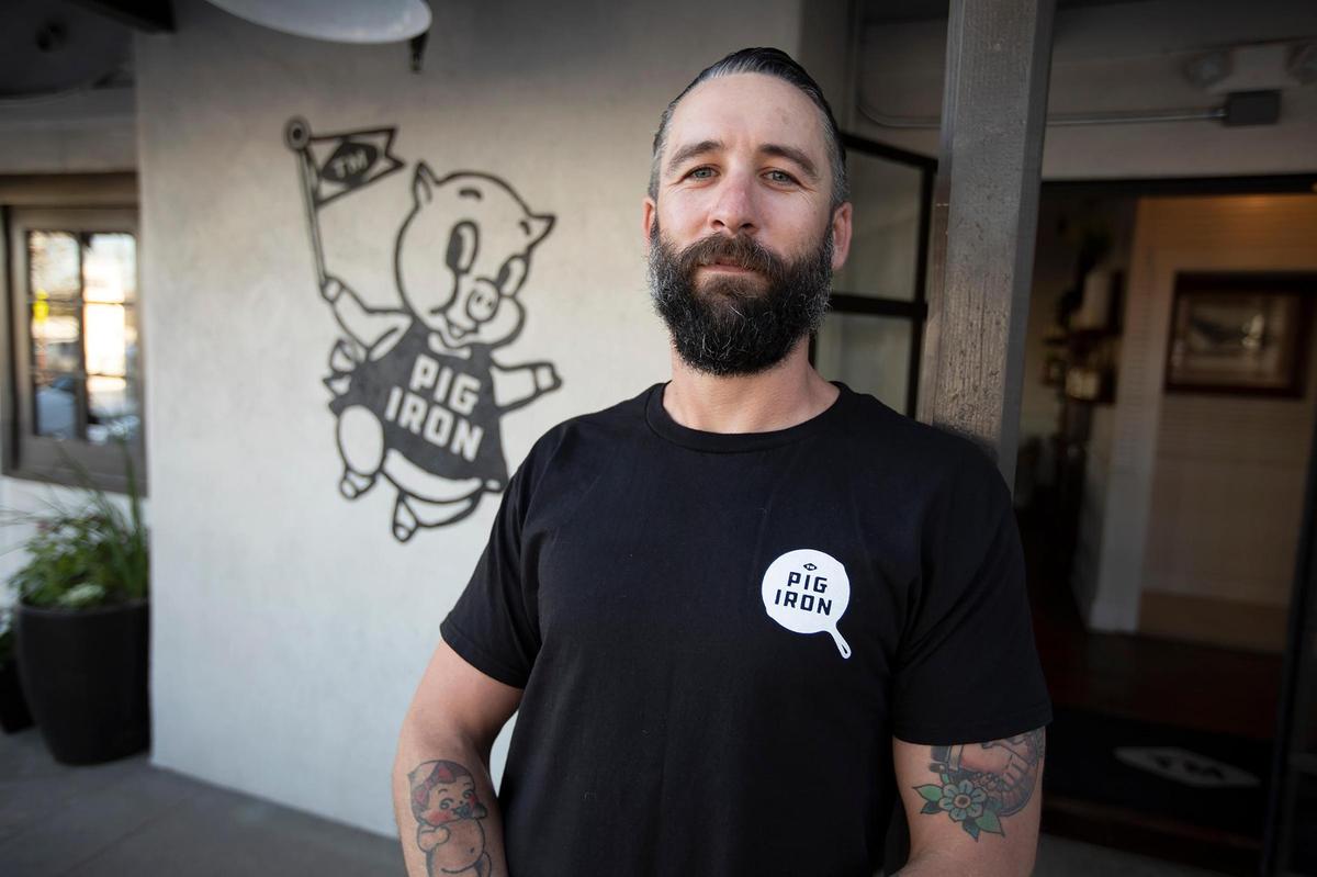 Taylor Odenwald is one of five friends who joined together to revitalize the old Templeton Mercantile building that used to be home to A.J. Spurs. Their first phase is the Pig Iron restaurant, which has an outdoor heated patio and fire pit.