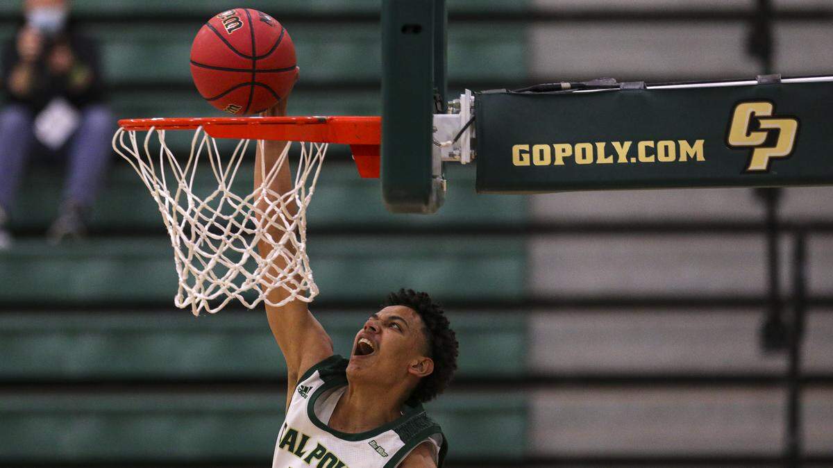 Kobe Sanders had 16 points in the Cal Poly basketball team’s win over beat Bethesda 100-46 on Nov. 27, 2020. Fans were absent from the bleachers due to coronavirus restrictions.
