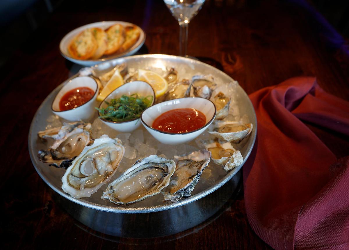 Oysters on the half-shell are served on a bed of ice at Kicker’s in Morro Bay. The seafood restaurant opened at 850 Embarcadero on Friday, February 10, 2023.