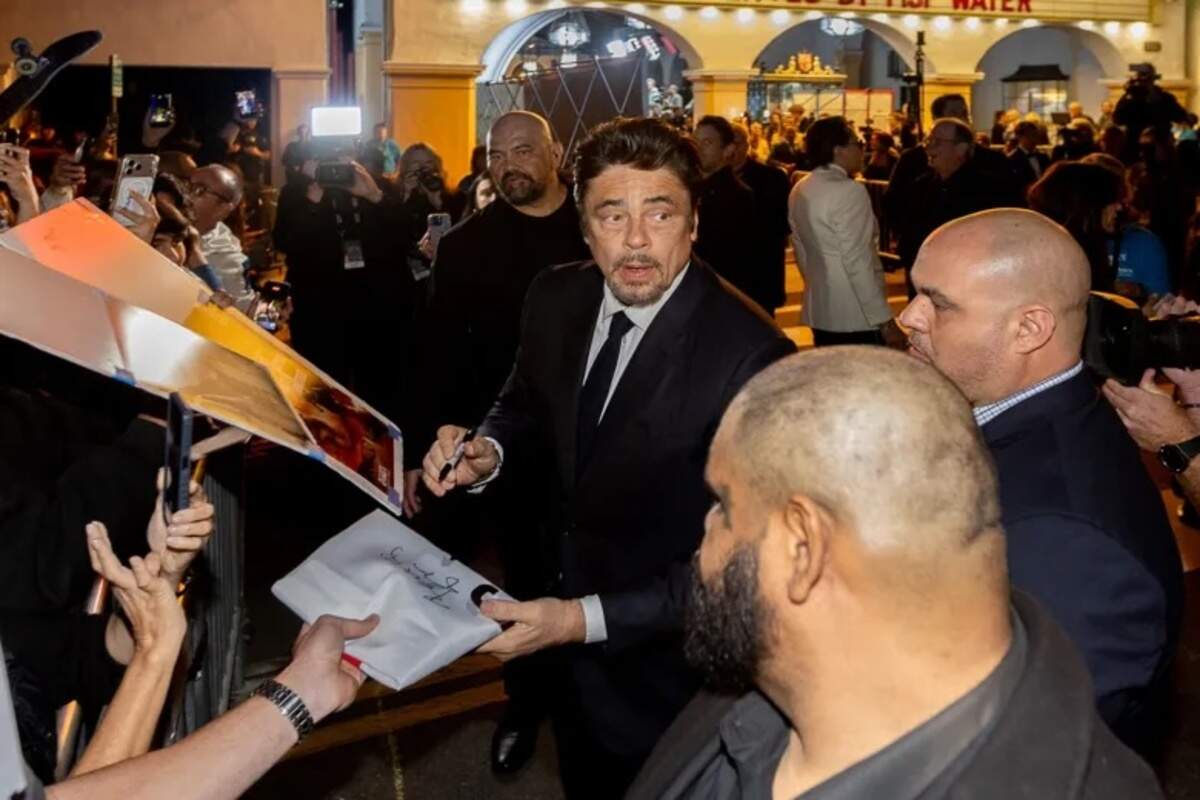 Actor Benicio del Toro signs autographs Monday night, Feb. 9, 2026, on the red carpet during the Santa Barbara International Film Festival.