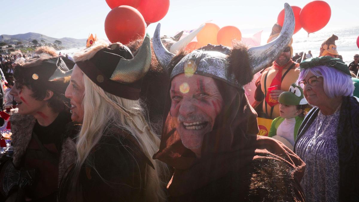 Viking travelers were present on the Pacific shore. About 1,000 people celebrated the New Year, some in costume, plunging into the surf at Cayucos at the 44th annual Carlin Soulé Memorial Polar Bear Dip on Jan. 1, 2024.