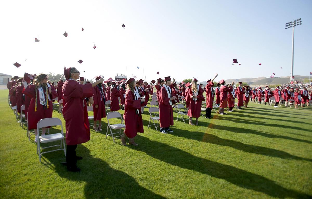 New graduates toss their hats in the air at the conclusion of the graduation ceremony. Nipomo High School celebrated 186 new graduates Friday, June 6, 2025. Twenty-nine students received scholarships totaling over $173,000.
