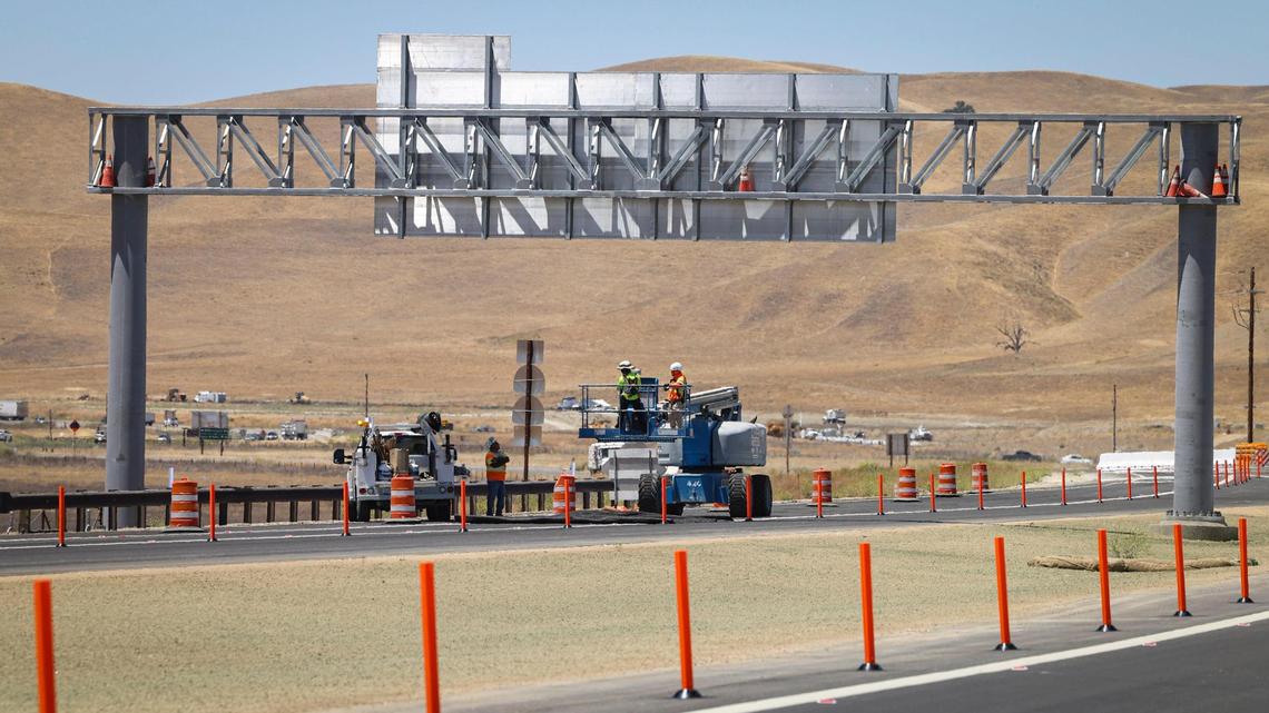Construction crew works on interchange signage at the new Highway 41/46 interchange. Caltrans District 5 and the San Luis Obispo Council of Governments (SLOCOG) gathered at the site on June 11, 2025, to celebrate completion of the project at the Cholame “Y.” The ongoing highway widening work in eastern San Luis Obispo County is expected to be complete in 2026.