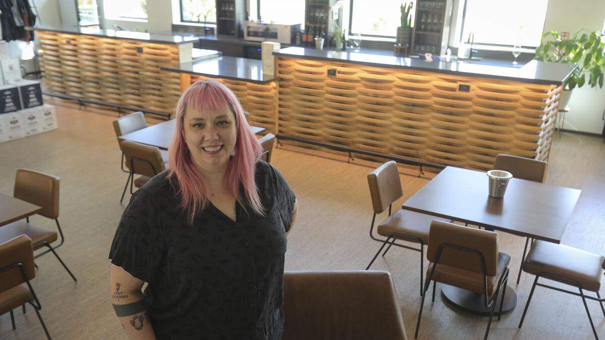 Liz Gillingham, director of business operations in the new McPrice Myers Wines tasting room on Adeladia Rd. west of Paso Robles. Wooden barrel staves are the tasting room's bar seen here on Sept. 9, 2025.