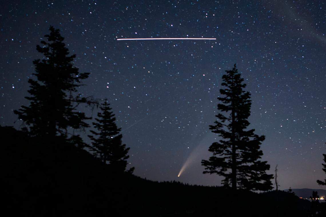 San Luis Obispo photographer Dave Fleishman shot this photo of the NEOWISE comet with the International Space Station flying overhead in the skies above Lake Tahoe.