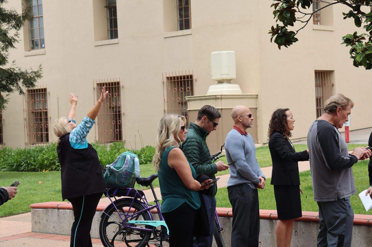 Over a hundred people gathered on the steps of the San Luis Obispo Superior Courthouse to celebrate the National Day of Prayer on Thursday, May 1, 2025, an event led by District Attorney Dan Dow.