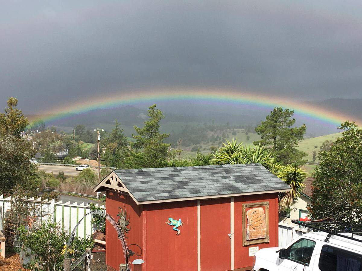 A full rainbow was seen from Susan Oyler’s front deck on McCabe Drive, looking toward Rocky Butte.