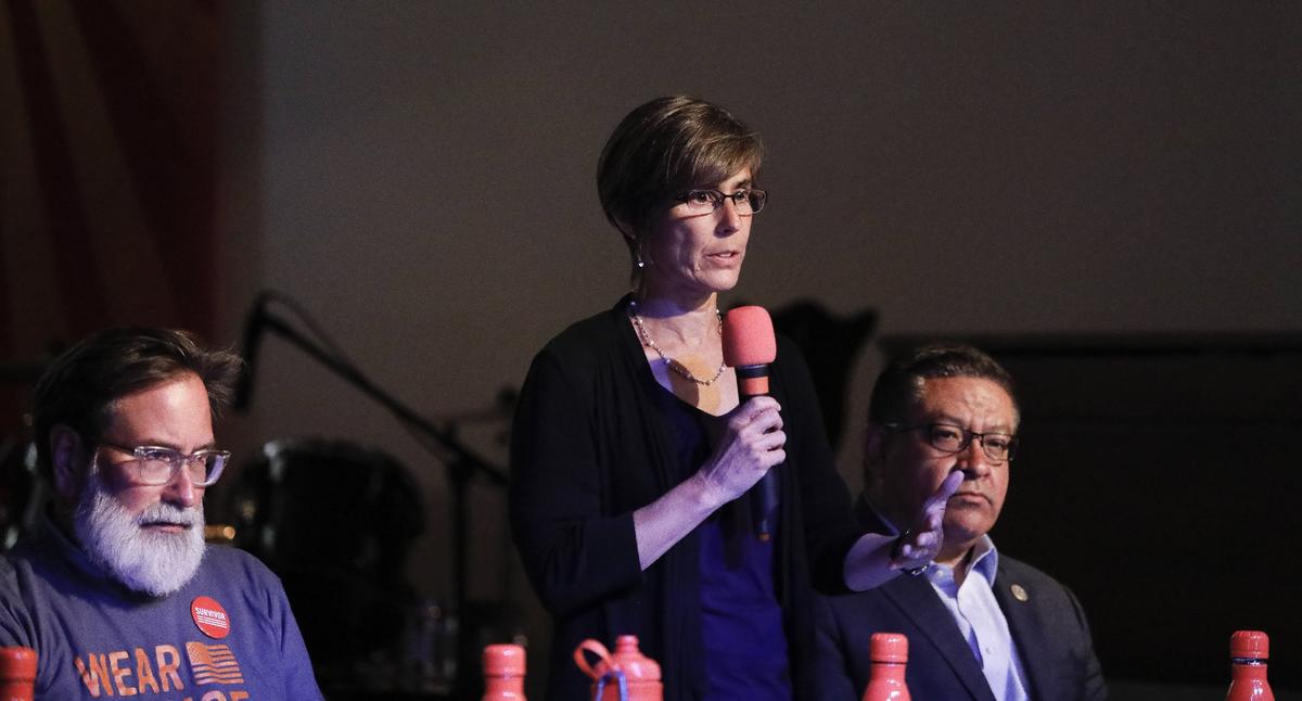 SLO Council woman Andy Pease has denied any conflict of interest in casting a city vote on encouraging all-electric construction standards. Here, Pease speaks at a town hall on gun safety in 2018.