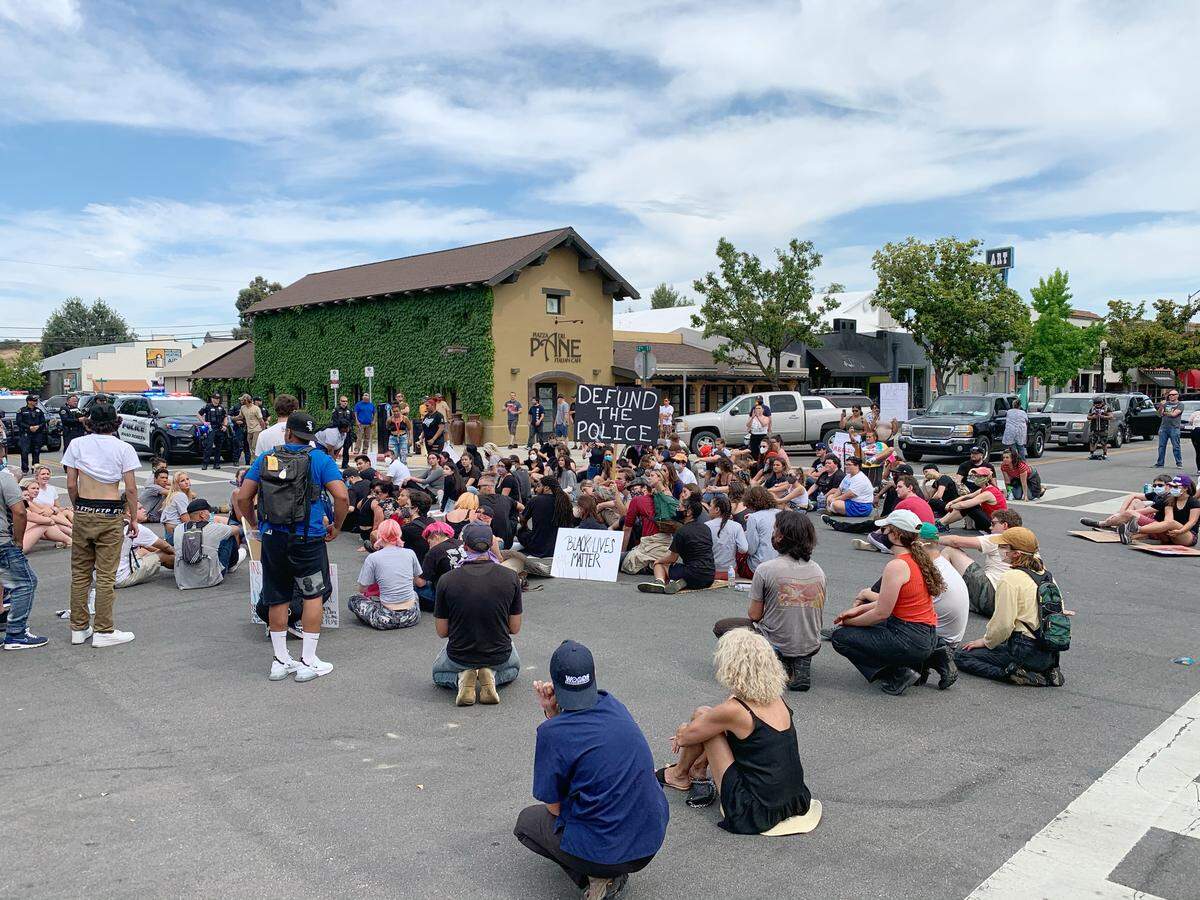 Protesters gather at the intersection of 12th and Pine streets in Paso Robles on Tuesday, June 2, 2020.