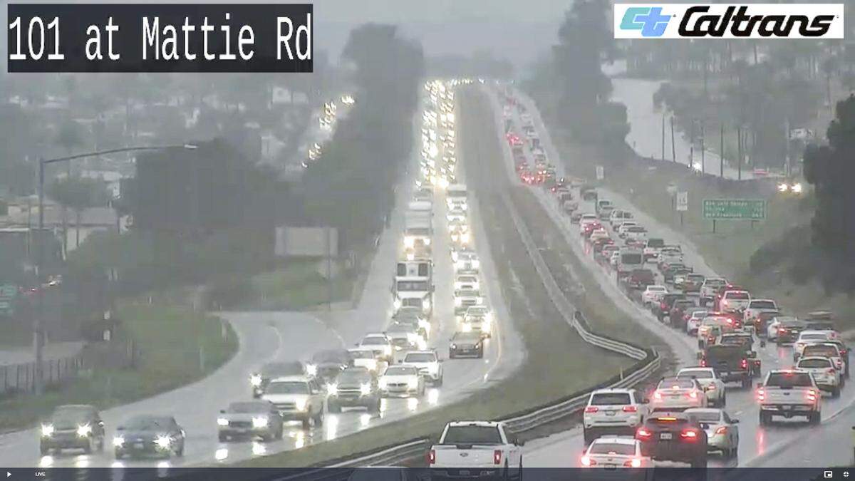 Traffic on Highway 101 near Mattie Road in Pismo Beach as a storm arrives on Nov. 13, 2025.