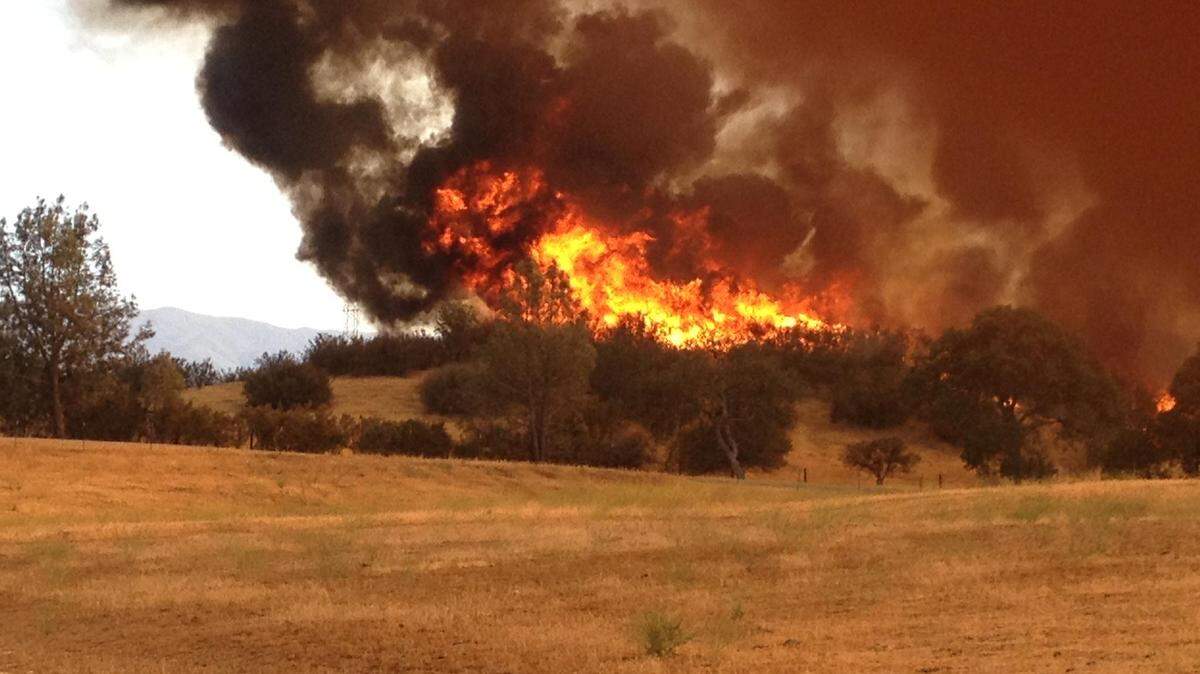 A fire was burning in the Park Hill area near Santa Margarita on Saturday. This photo was taken in the 2000 block of Park Hill Road.