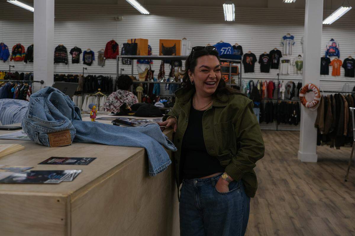 Tatum Berhrens checks out after finding some vintage items at Thirfty Beaches in downtown San Luis Obispo on Black Friday, Nov. 29, 2024.