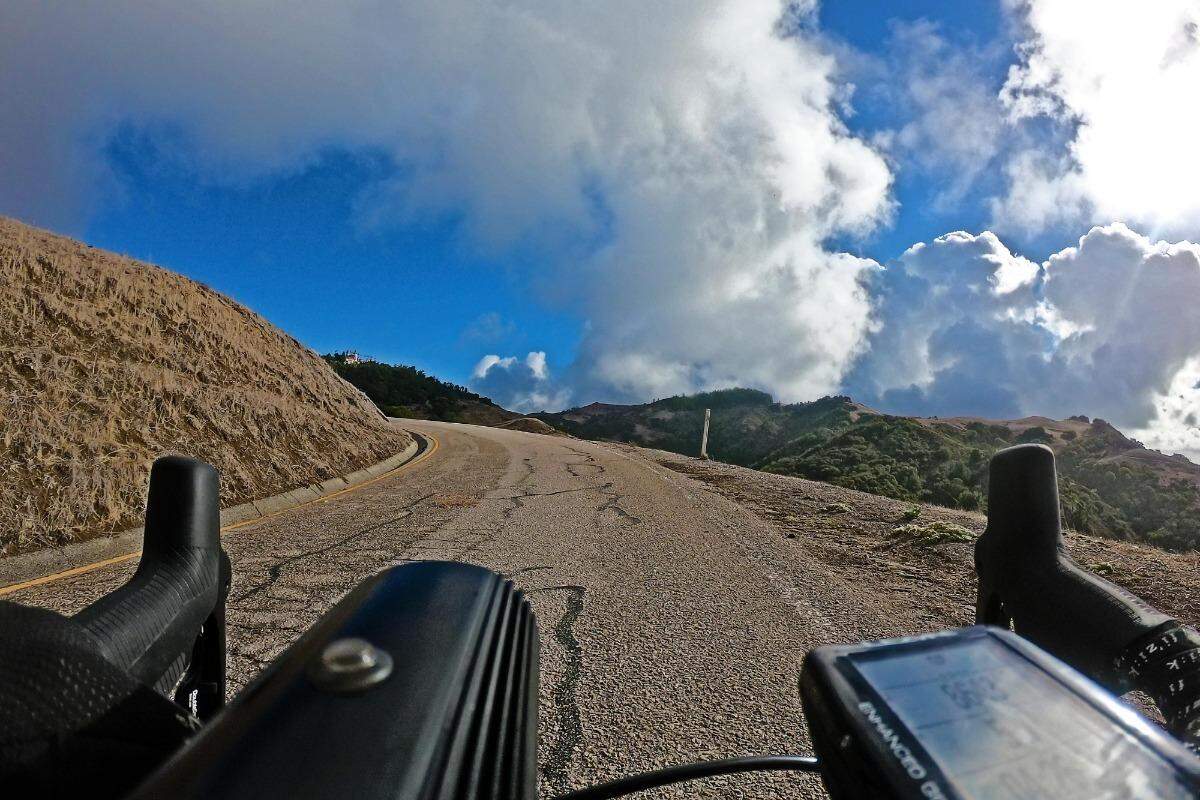 Cubby Cashen rides up the road to Hearst Castle on one of the more than 22 trips he made on Thanksgiving Day.