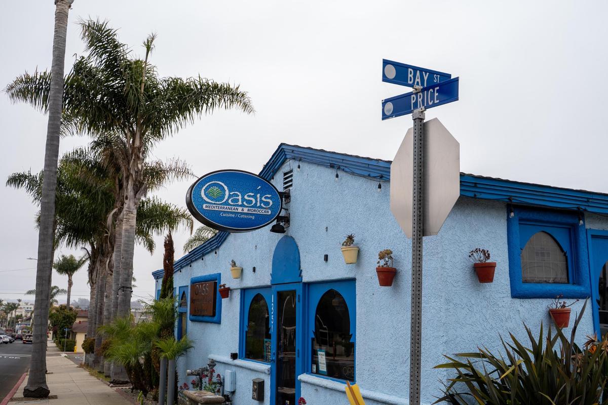 The century-old restaurant building currently occupied by Oasis Moroccan Restaurant along with an old gas station and 10 houses near the intersection of Price and Dolliver streets in Pismo Beach, California, are slated for demolition as part of a new mixed-use “gateway” project from developer Coastal Community Builders, pictured here Wednesday, June 4, 2025.