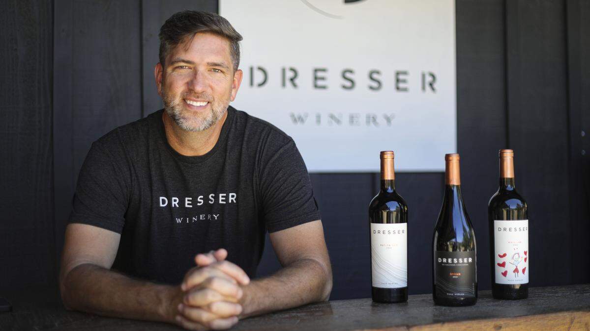Kory Burke, owner - winemaker at Dresser Winery is processing how tarriffs will impact a business that imports equipment and barrels while it exports wine, seen here on. Aug. 28, 2025.