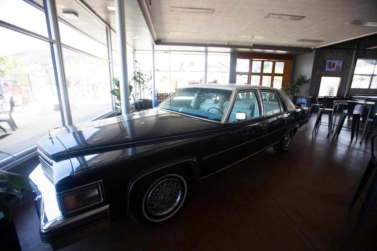 A vintage Cadillac sits in the front room of Krobar Distillery at The Hub in San Luis Obispo. The Hub is the latest entertainment spot in San Luis Obispo, featuring new locations for Krobar and Central Coast Brewing at the former home of Daylight Home and Patio on Monterey Street.