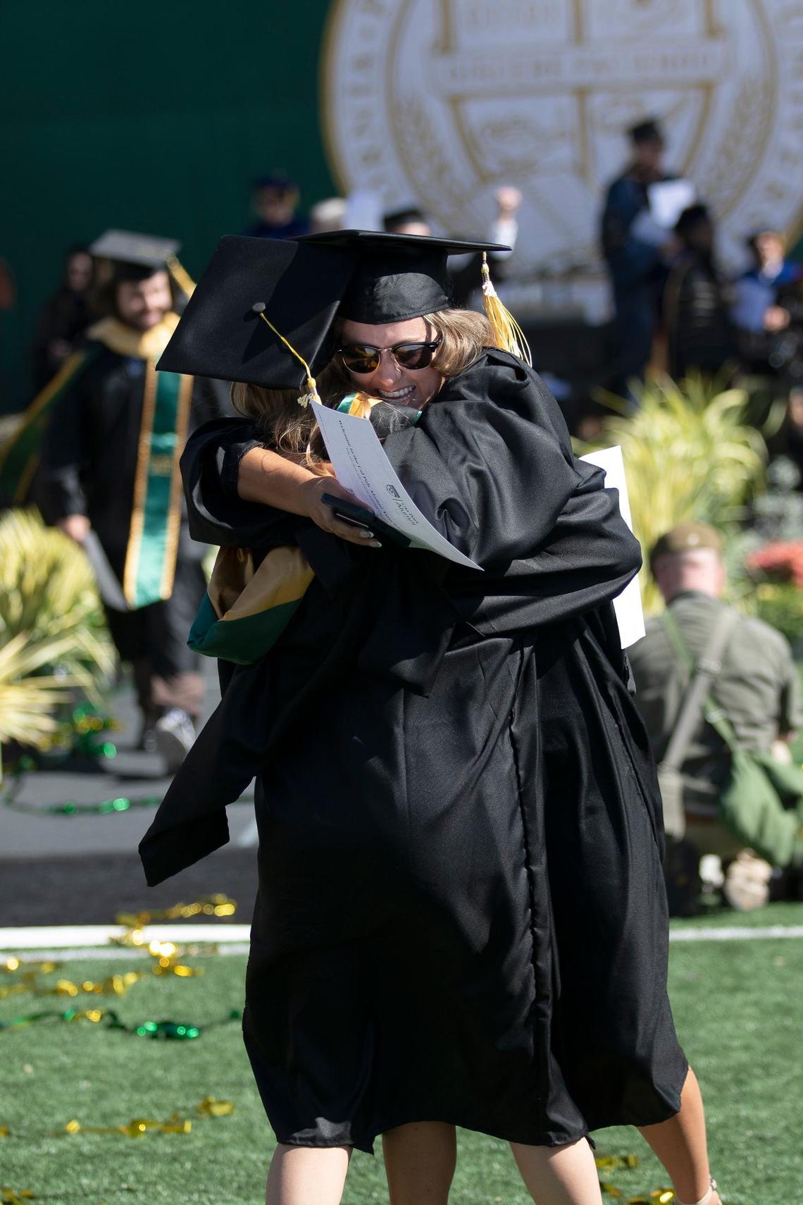 Cal Poly kicked off graduation weekend with three ceremonies on June 15, 2024. The university expects to celebrate more than 6,300 graduates throughout the weekend. Sarah Solis, right, and Grace Damaschino both Master of Science, Environment Science Management majors, hug each other after getting their diplomas.