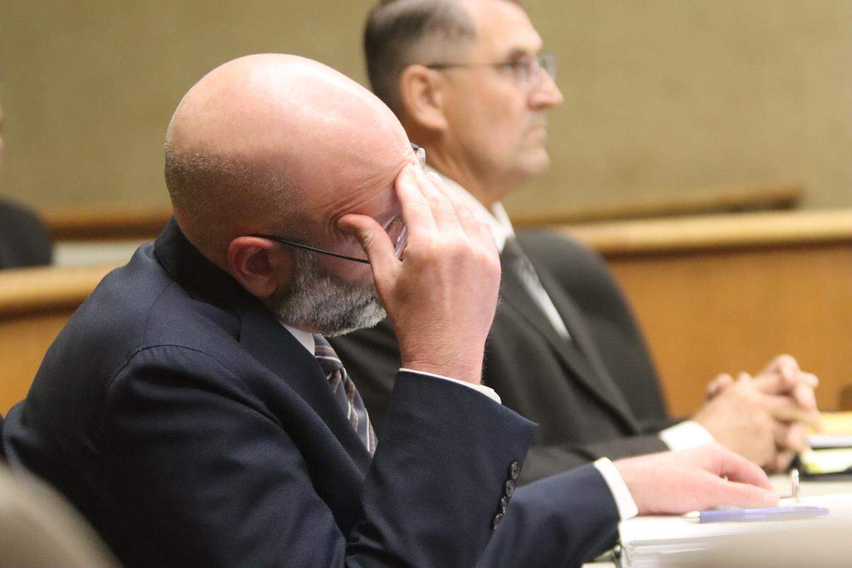 Deputy District Attorney Ben Blumenthal, left, District Attorney Investigator Fred Phlum and Gaea Powell, seen here in court during Powell’s preliminary hearing on April 1, 2026. Powell is charged with nine counts of election fraud.