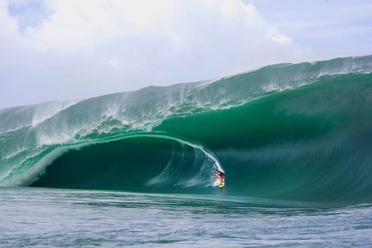 Bruce Irons catches a wave off the coast of Teahupo’o, French Polynesia, in a scene from the surf documentary “White Rhino,” screening as part of the 2021 San Luis Obispo International Film Festival.