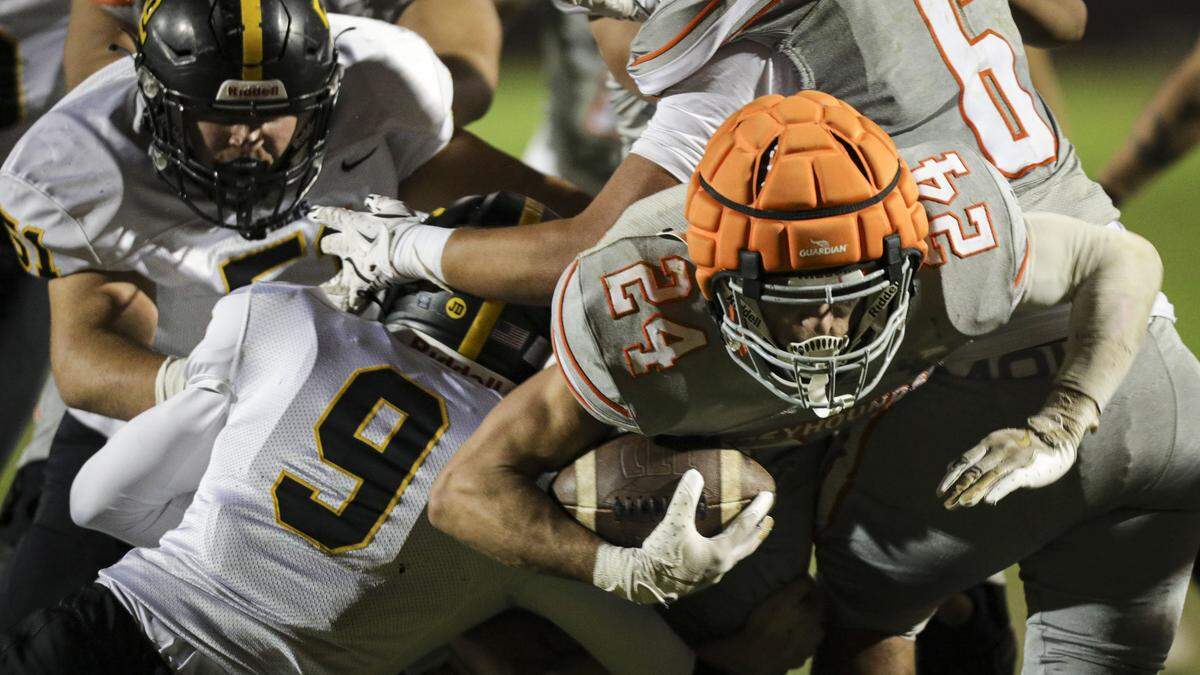 Damon Mitchell was stopped short of the goal line by the Tigers on this play. San Luis Obispo beat Atascadero 28-14 in high school football on Oct. 31, 2025.