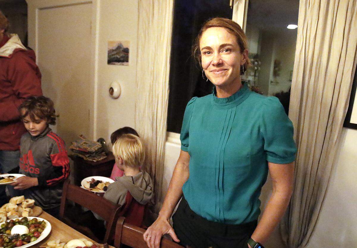 San Luis Obispo City Council candidate Emily Francis welcomes supporters at her election night party before polls close on Tuesday, Nov. 8, 2022.