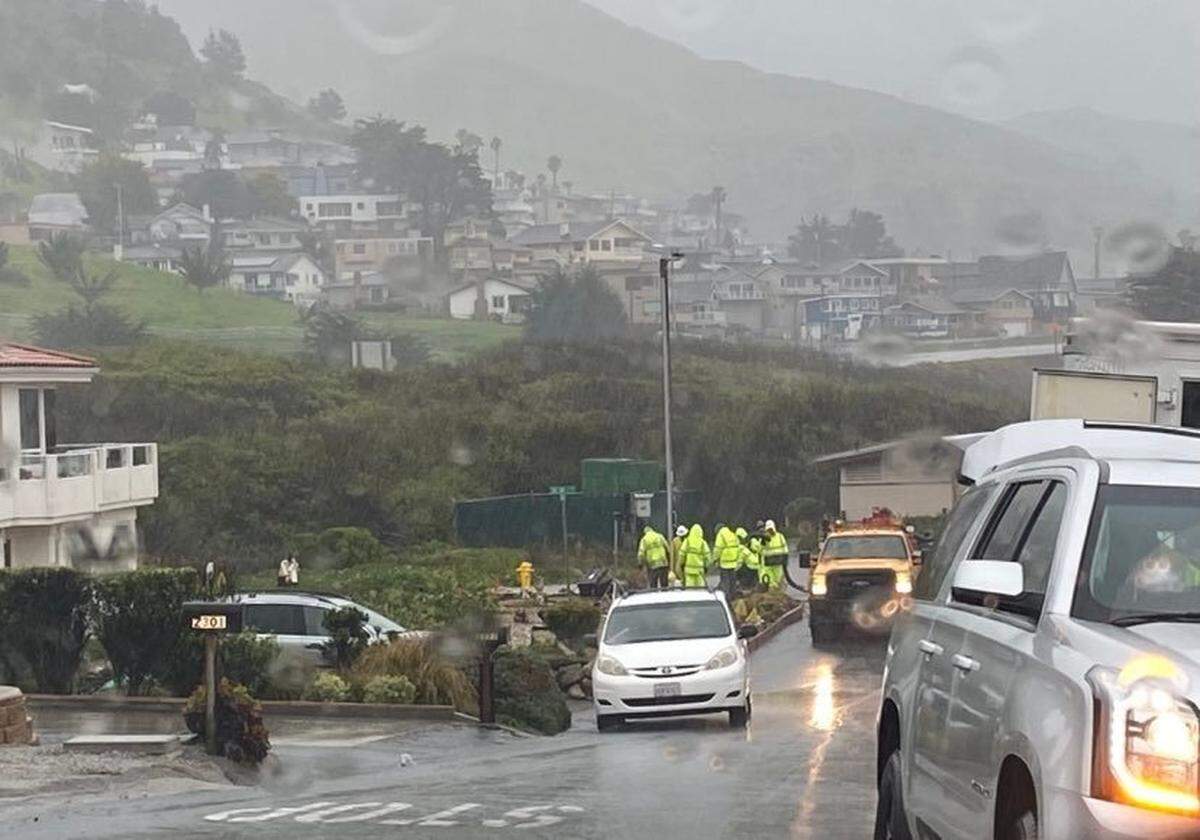 Utility workers work on a gas line in Cayucos on Tuesday, March 14, 2023.