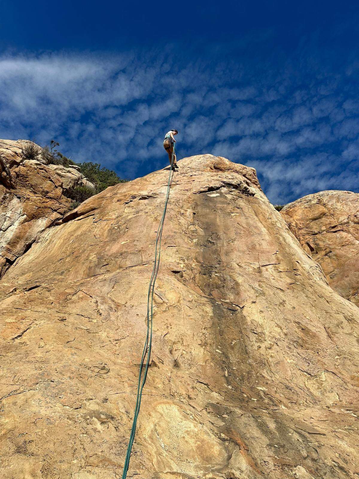 Kenneth Taylor rappels down a rock face. Taylor, a third-year Cal Poly student, died while on a climbing trip at Salmon Creek waterfall in Big Sur on April 6, 2024.