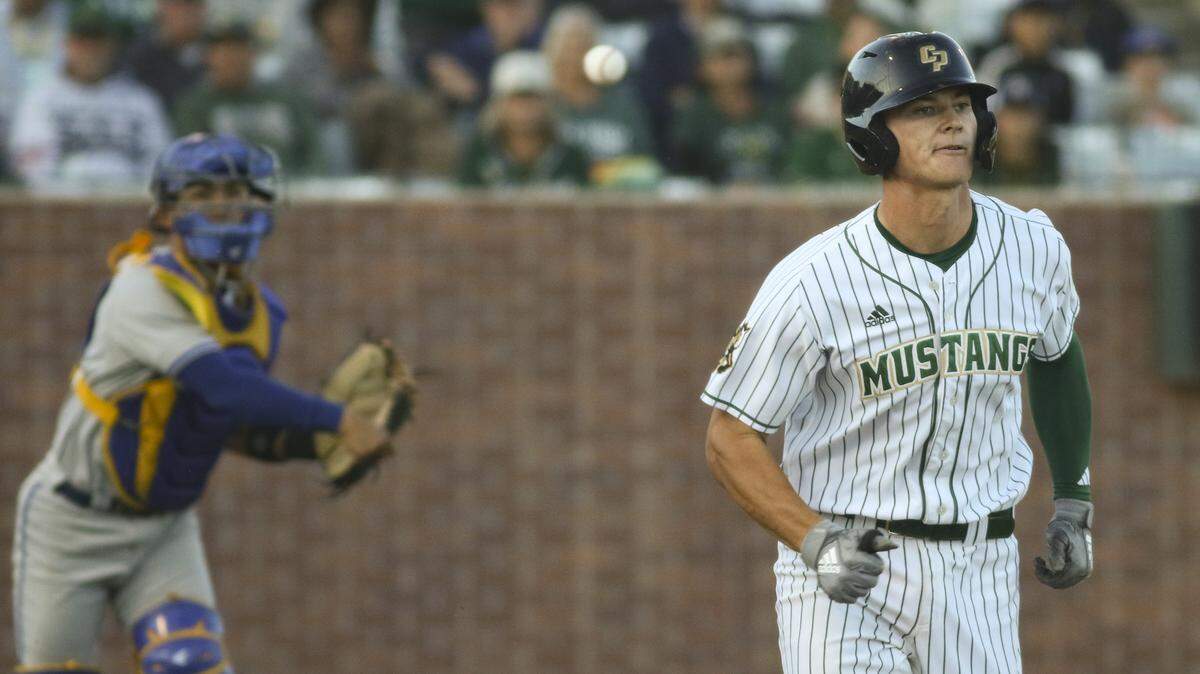 Ryan Tayman is thrown out by catcher Nico Libed on a ball hit in frot of the plate. Cal Poly lost 6-0 to UCSB on April 2, 2026.