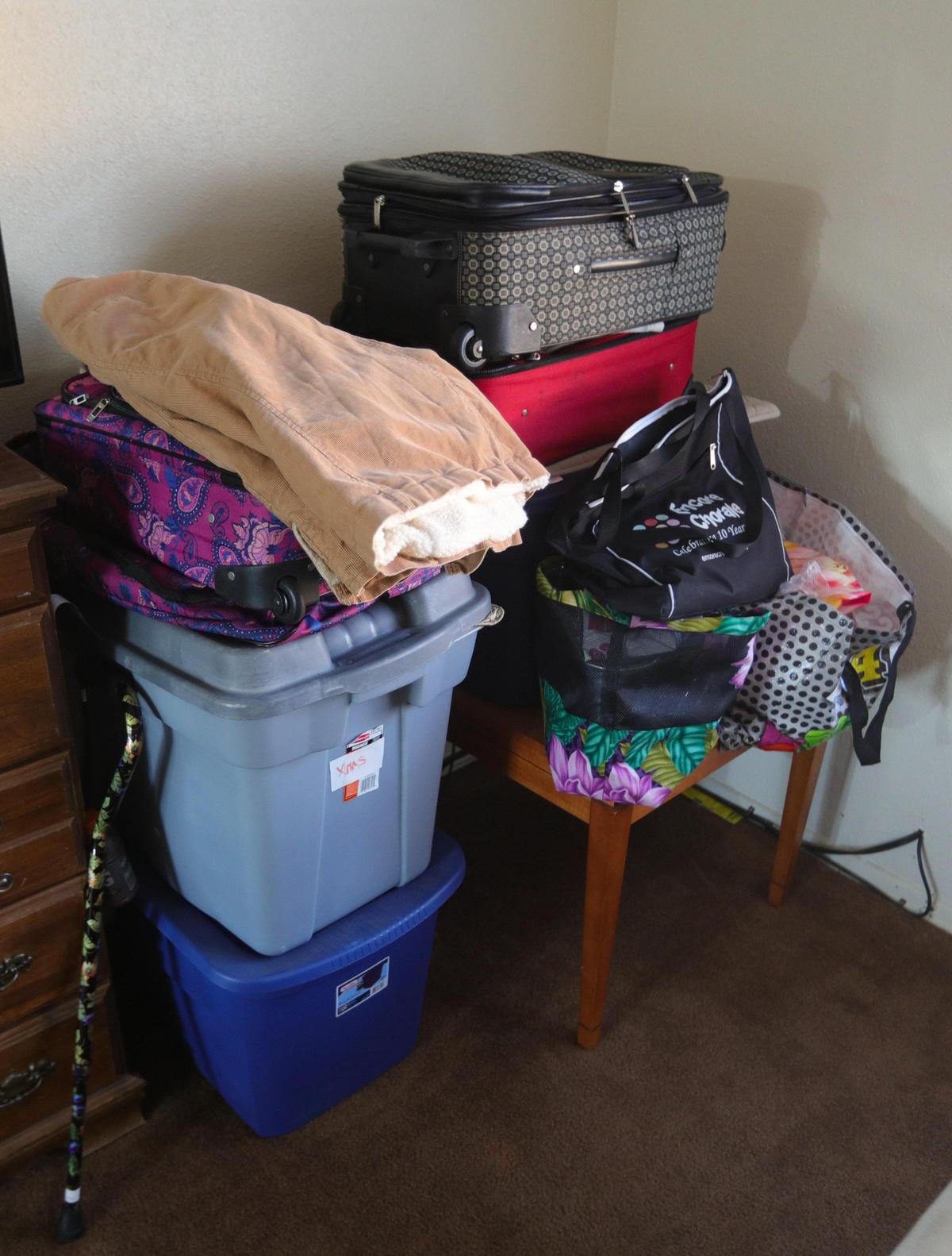 Some Grand View Apartments renters kept their belongings in suitcases and plastic containers to prevent bedbugs and cockroaches from getting in.
