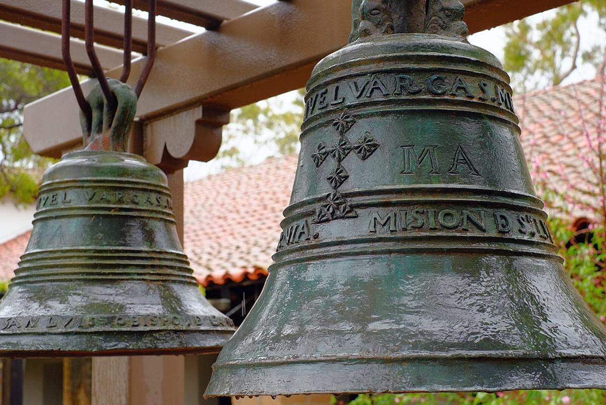 The original Manuel Vargas 1818 bells hang in the Mission San Luis Obispo garden on a platform donated by Maino Construction Co.