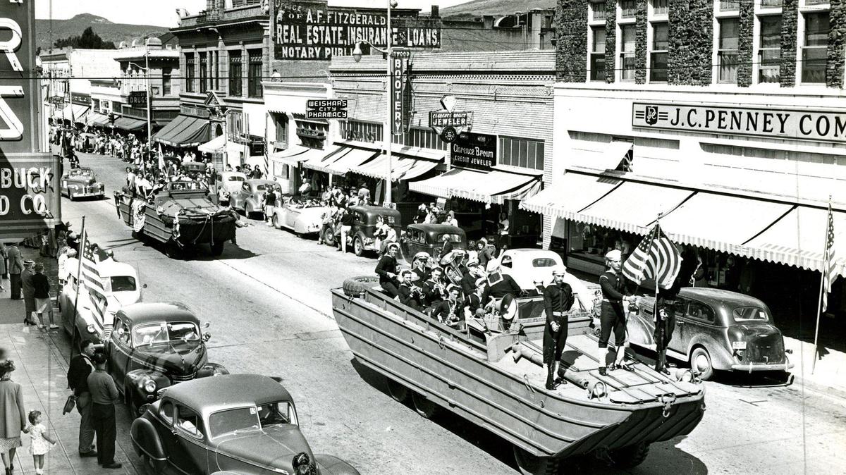 A Purple Heart Parade with amphibious vehicles moves up Higuera Street in downtown San Luis Obispo in June 1945.