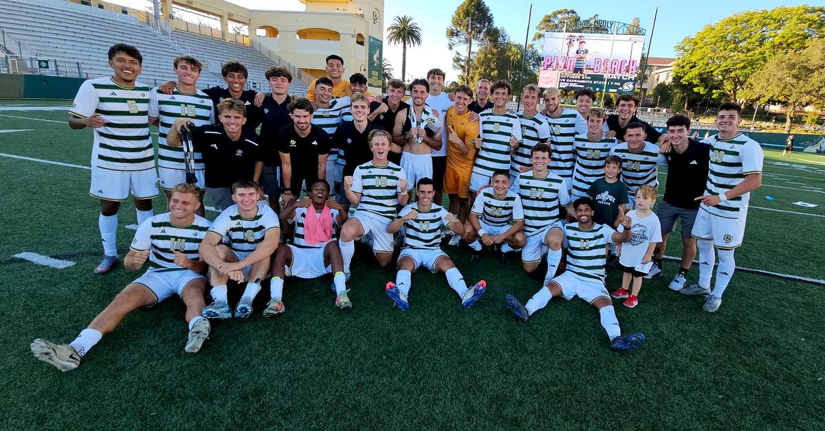 Cal Poly beat UCSB 2-0 in the annual Blue-Green Rivalry soccer game on Sept. 28, 2024. The team and coaches pose for a post-game portrait.