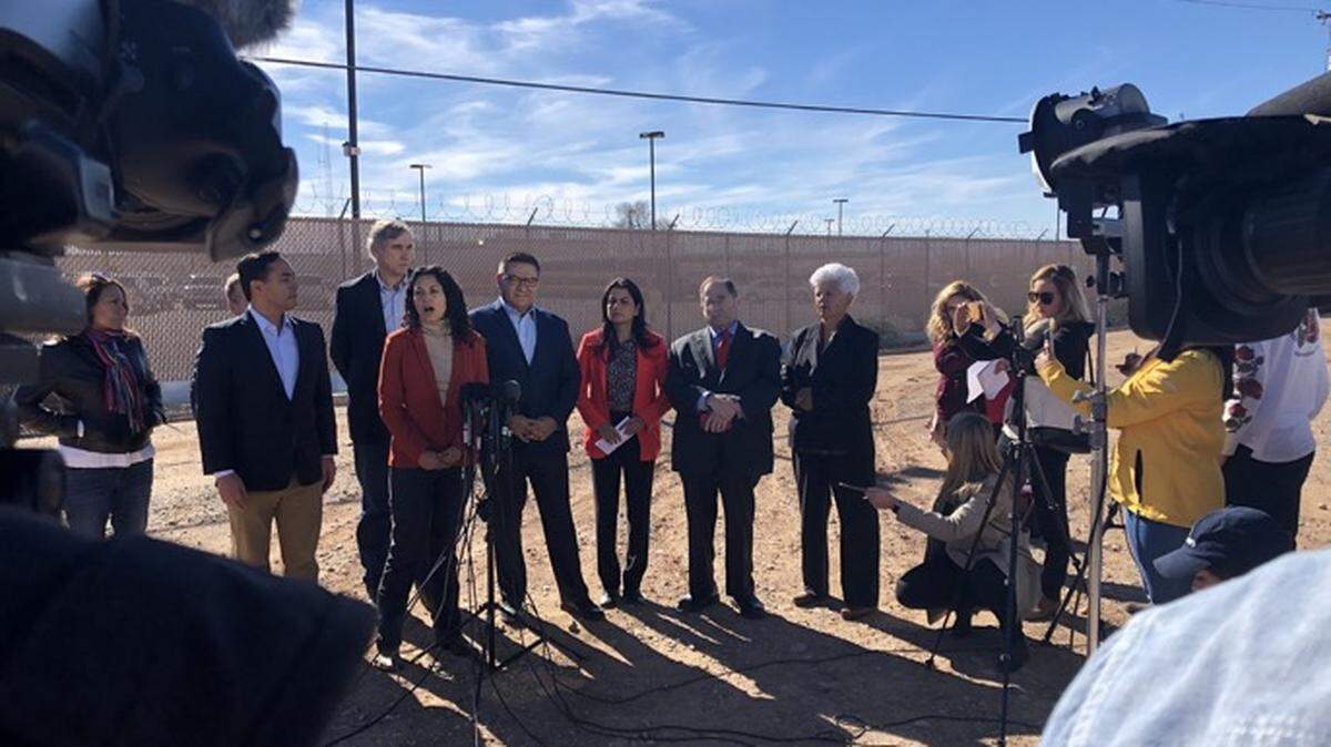 U.S. Rep. Salud Carbajal, fifth from left, attends a news conference outside the U.S. Customs and Border Protection’s detention facility in Almogordo, New Mexico, on Monday following the deaths of two migrant children.