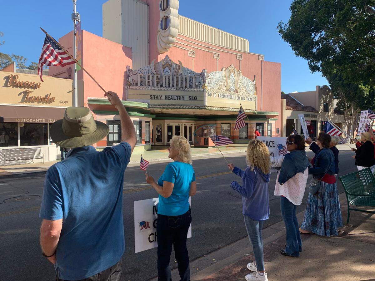 Protesters rally on Monterey Street in San Luis Obispo in support of District Attorney Dan Dow and Central Coast law enforcement agencies on Aug. 27, 2020.