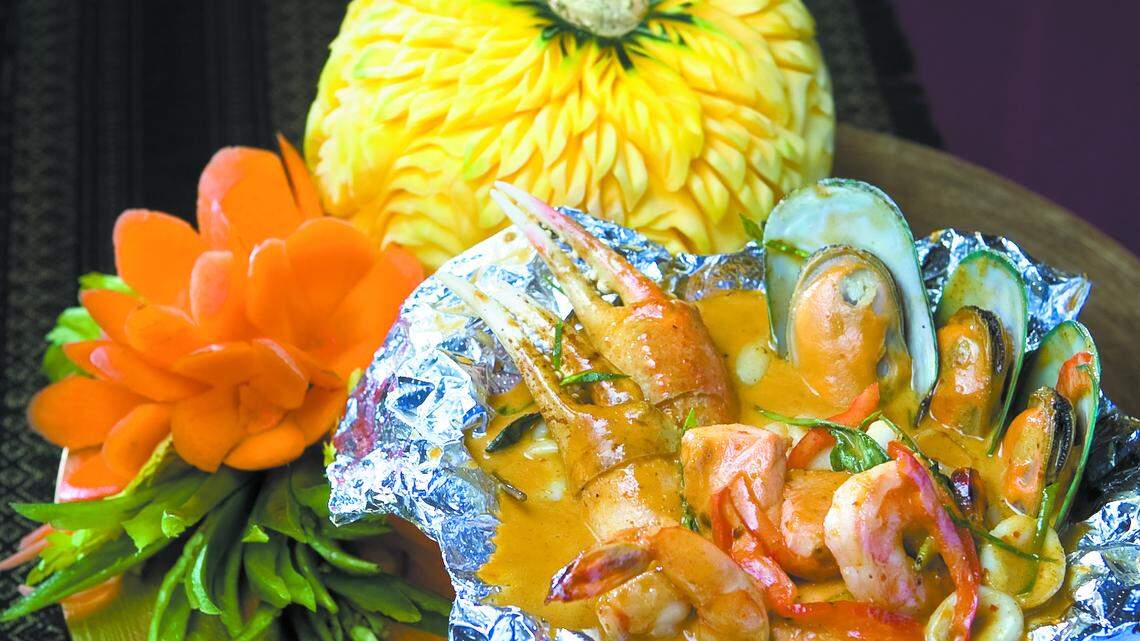 SCHUSCHI TALAY Spicy Seafood 22.95 Mushrooms, lemon grass, ginger, chili, & Thai spices stir-fried with squid, shrimp, fish, crab, and mussels. 
 
Thai Talay Restaurant on Price Street in Pismo Beach.
David Middlecamp
3-10-2011