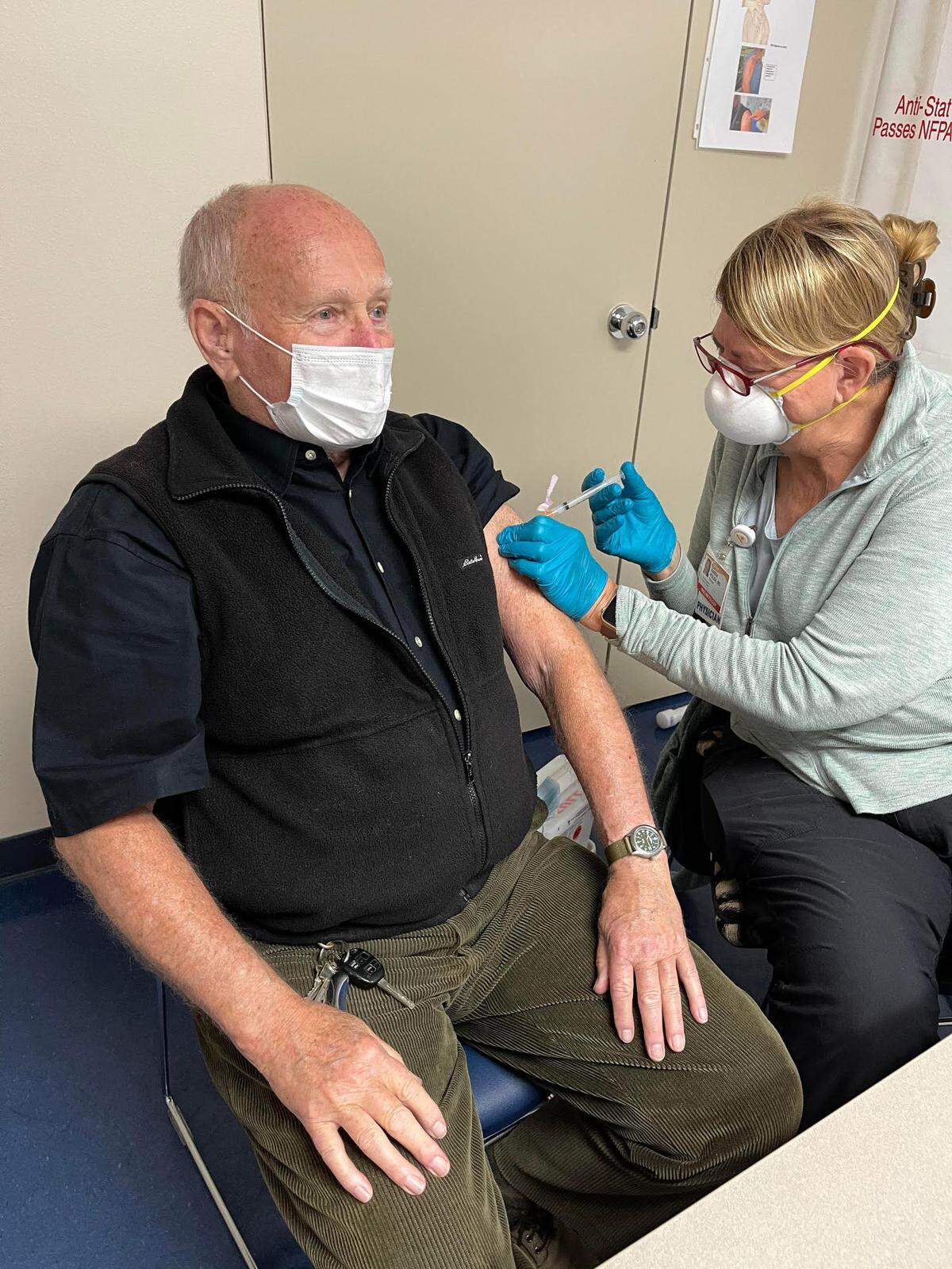 Paul Kellett, 82, of Cambria, gets his first Moderna vaccine injection on Monday, Jan. 18, 2020, in San Luis Obispo. It was the first day that seniors ages 75 and older were eligible to receive the vaccine.