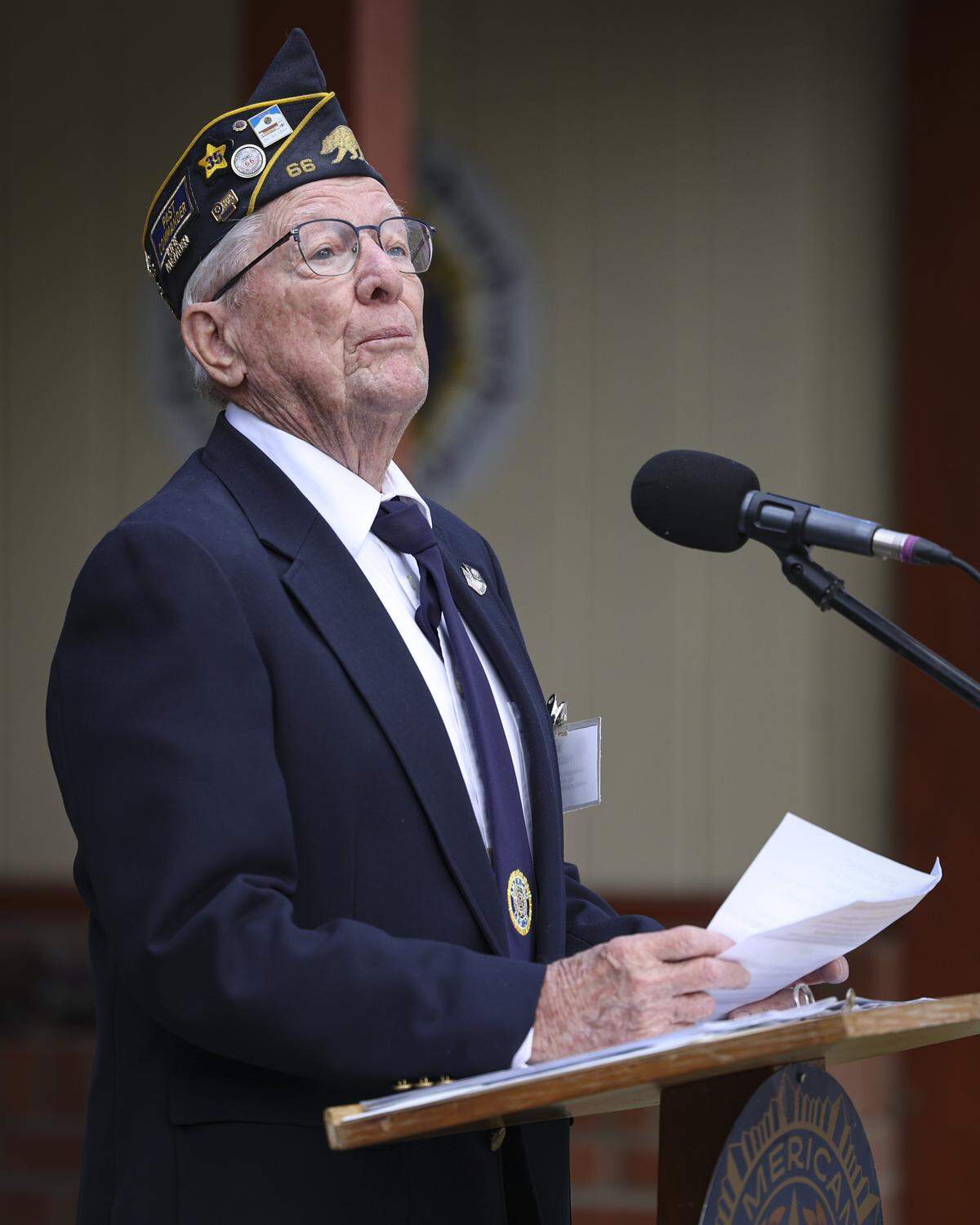 U.S. Navy Veteran Bill Fieldhouse reads the poem “Ragged Old Flag” at the Memorial Day observance held on May 25, 2026, at the America Legion Post 66 in San Luis Obispo.