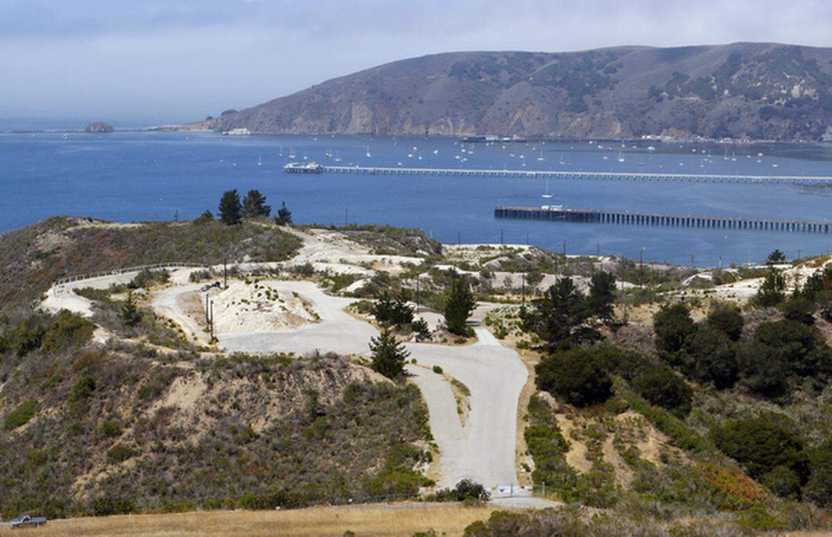 The old Unocal tank farm property offers panoramic views over Avila Beach, as seen in a 2015 photo. The property is now owned by Chevron, which is working to clean up lingering hydrocarbon pollution before proposing a future use for the site.