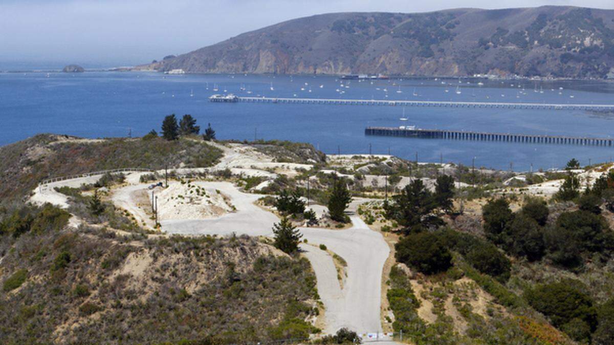 The old Unocal tank farm property offers panoramic views over Avila Beach, as seen in a 2015 photo. The property is now owned by Chevron, which is working to clean up lingering hydrocarbon pollution before proposing a future use for the site.