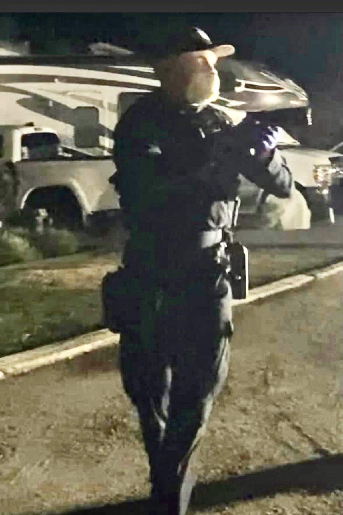Lisa Kania took a photo of the Atascadero police officer who drew his gun on her family after responding to a mental health crisis in summer 2021. She said it was Officer Zachary Yeaman-Sanchez, but Atascadero Police Chief Robert Masterson said in an email to Kania he could not confirm or deny the identity of the officer.