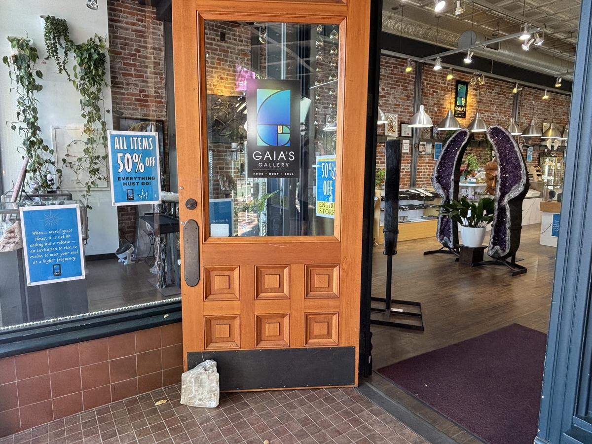 Gaia’s Gallery had blue-and-yellow closing signs on its windows and in the store, advertising the 50% off discount on all crystals, stones and jewelry. The store closed on Sept. 22, 2025.