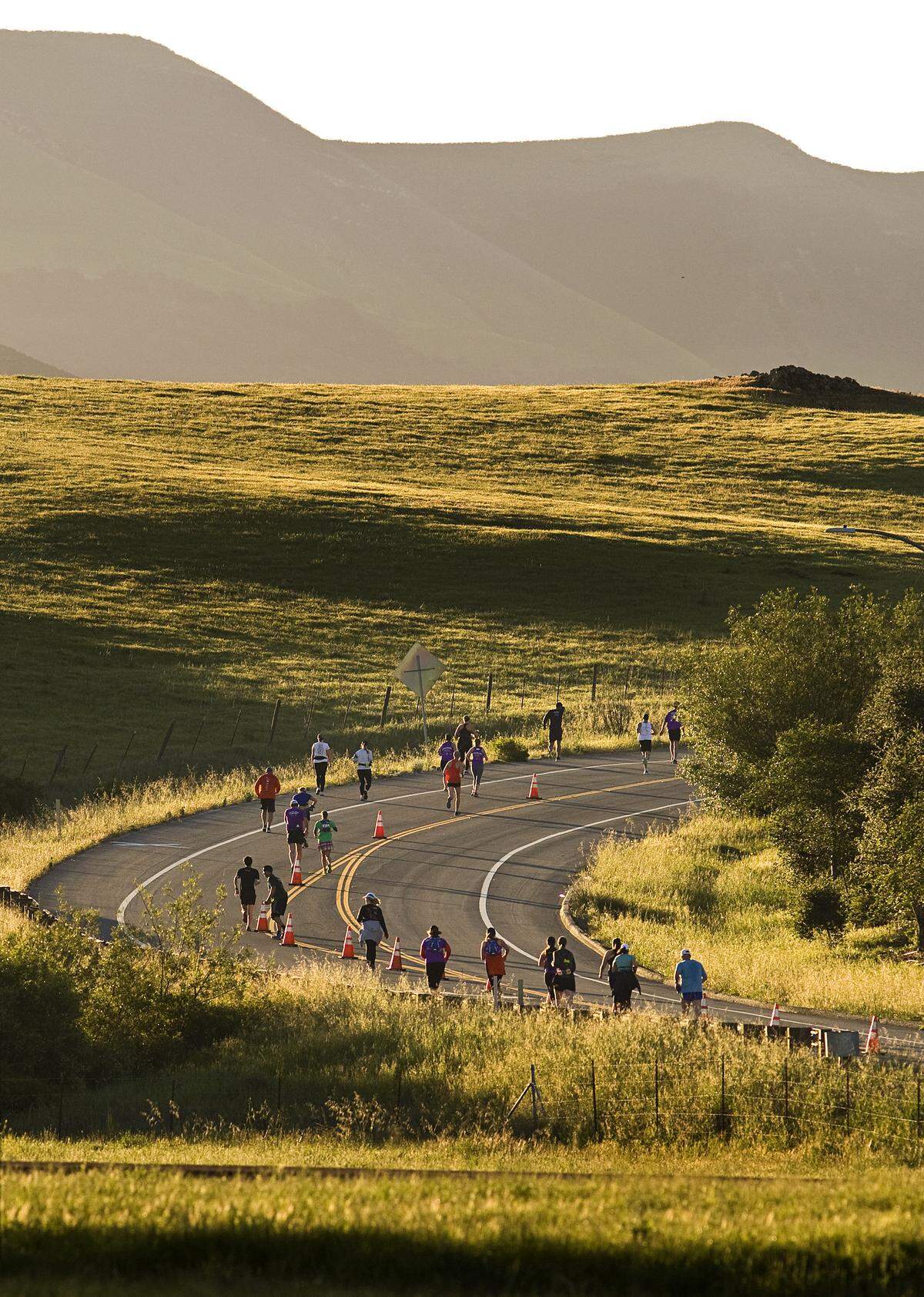 San Luis Obispo Marathon participants head out into Edna Valley on Orcutt Road on Sunday, April 27, 2014.