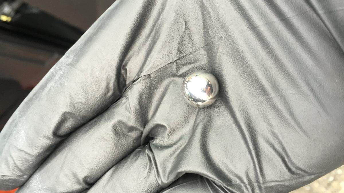 Windows were reported broken early Tuesday at 10 banks and the Apple Store in San Luis Obispo. Metal projectiles were found at several of the locations.