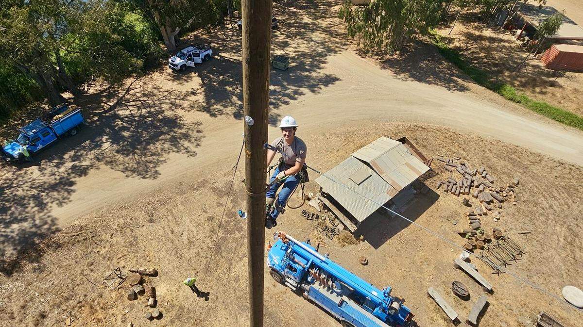 PG&E installed two 80-foot wood poles at Cal Poly to help the university’s logging team host a national forestry competition in 2026, where pole-climbing will be the main sport.