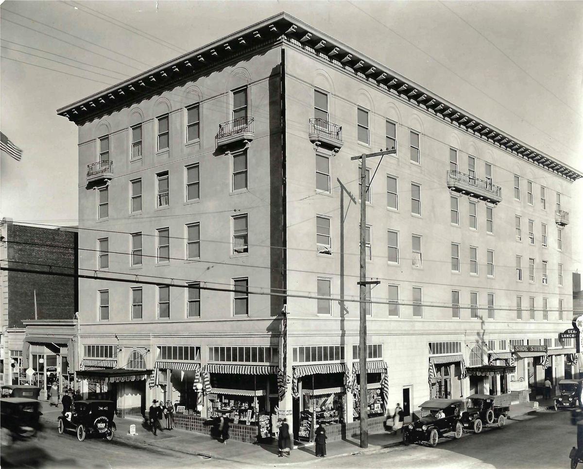 The Anderson Hotel at the corner of Monterey and Morro streets with bustling traffic between 1923 and 1930. An addition with tower was added at left side of Monterey Street side, an extension to Court Street and 40 new rooms were added in 1930. Barber shop, tailor, lunch room, optometrist, shoe shine business and a drug store were all on the ground floor.