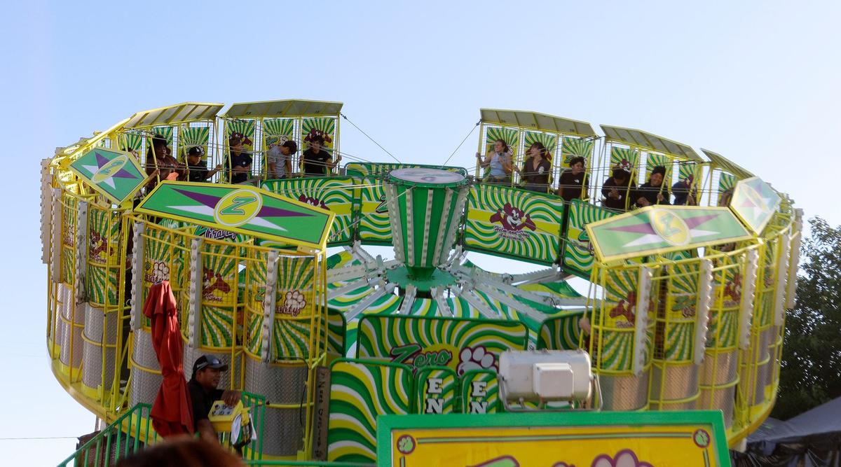 Tribune reporters Chloe Shrager and Kelsey Oliver take a spin on the Zero Gravity ride at the Mid-State Fair on Wednesday, July 17, 2024.