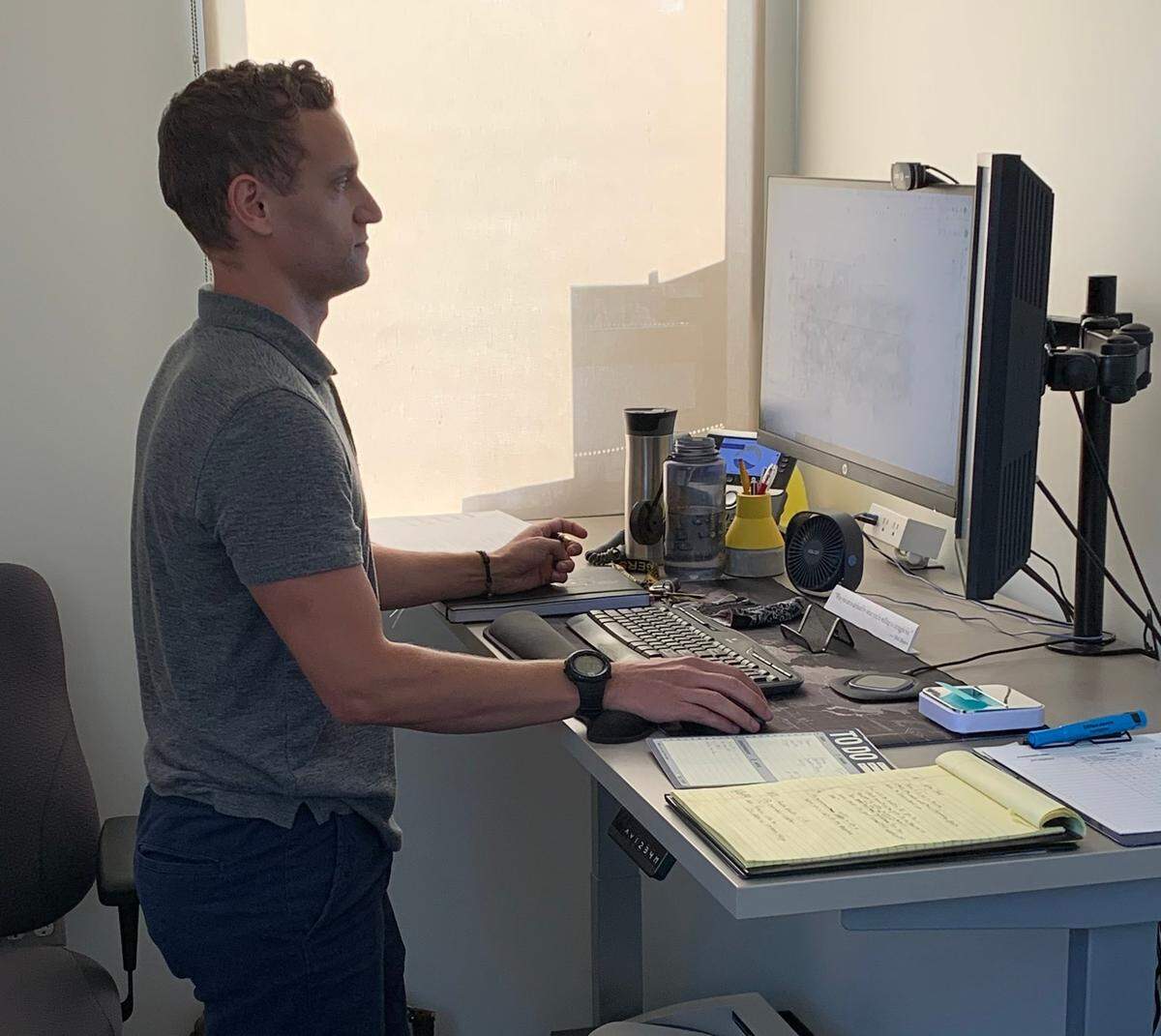 Chris Inman, a school counselor at San Luis Obispo High School, is pictured here working at his desk on Sept. 30, 2020.