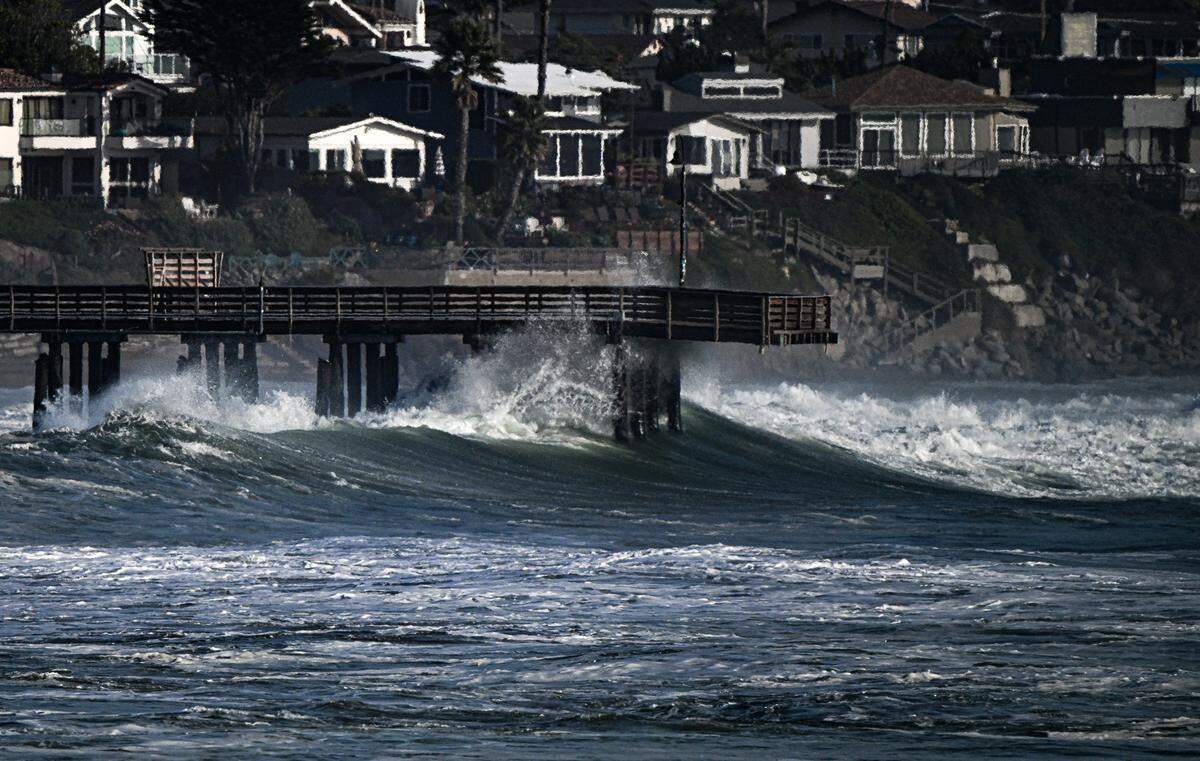 Powerful waves pounded the San Luis Obispo County coast on Dec. 23, 2024, even ripping a piling from the base of the Caycuos Pier. A view from Estero Bluffs State Park shows the waves.